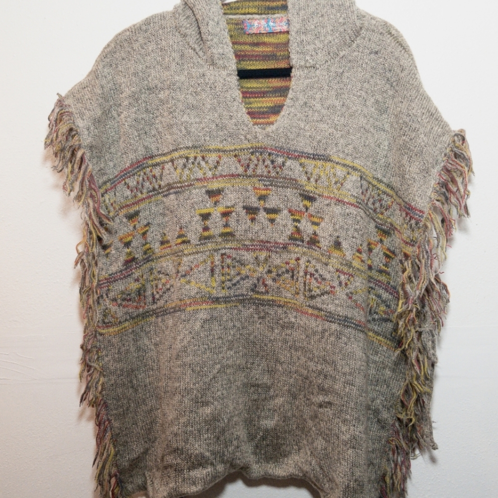 Selfie Couture. Gray hooded poncho with yellow and red Aztec design